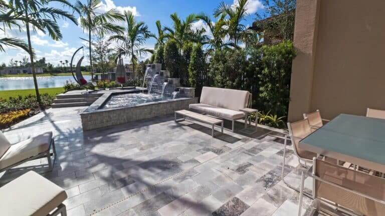 Backyard oasis with lush greenery, cozy seating area, and stylish outdoor decor.